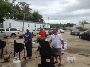 The Guys cooking fish to raise money for Relay for Life